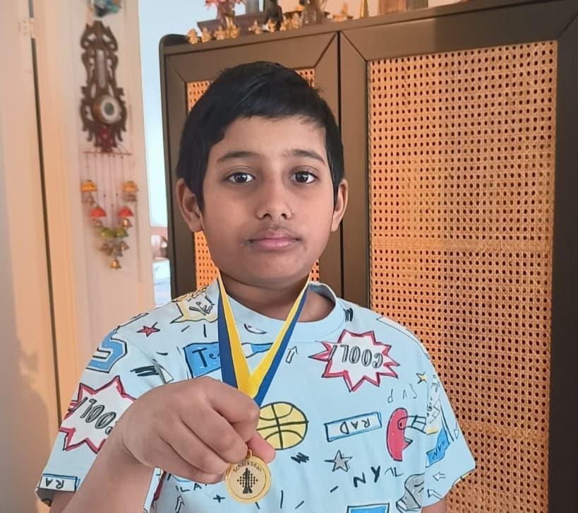 Vivin Andre with trophy